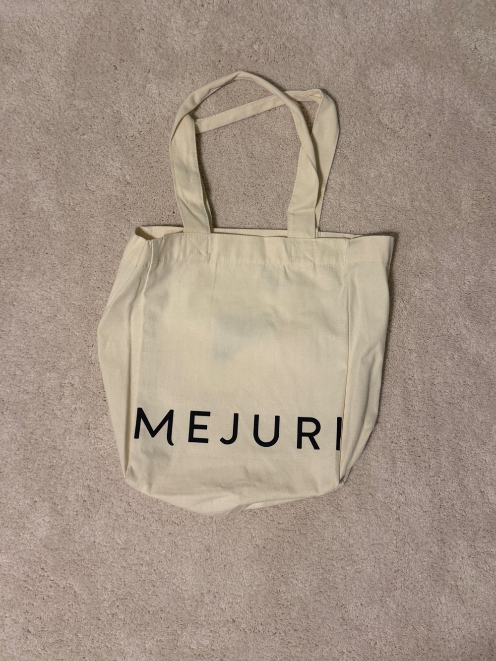 Mejuri Cream Canvas Tote with Bold Black Logo